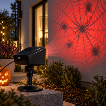 Halloween-projektor med krypende edderkopp